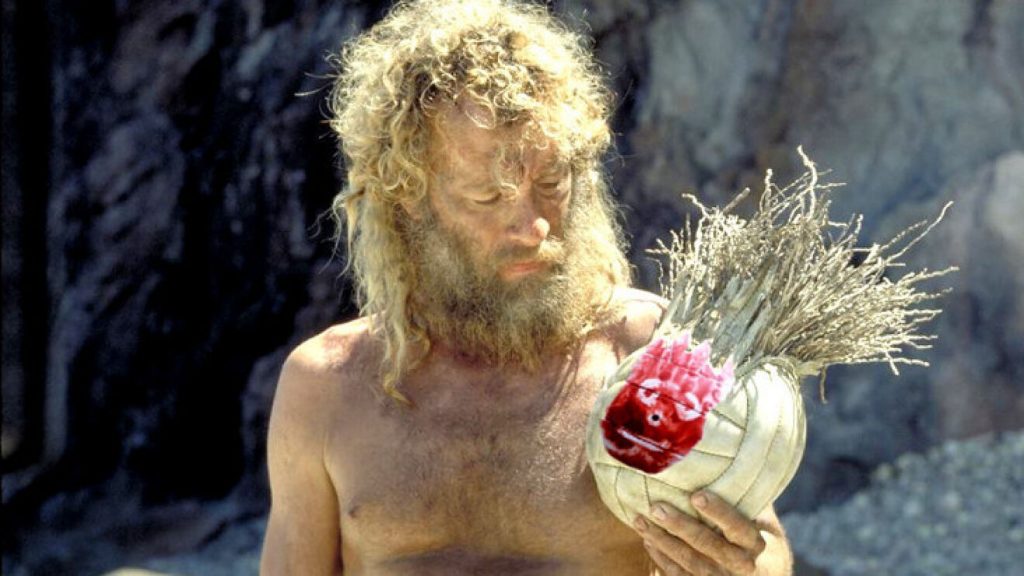 Tom Hanks sujetando a Wilson en la película «Náufrago».